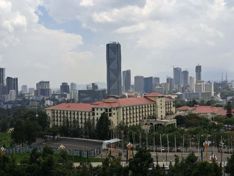 Addis Ababa Essentials: Flexible Full-Day City Sightseeing - Entoto Mountain, coffee, and a family table