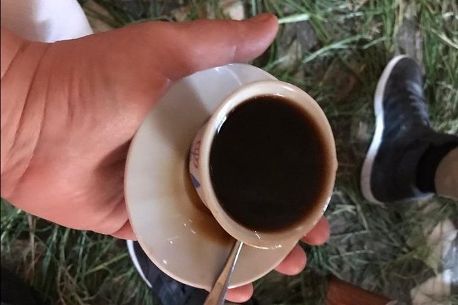 Ethiopian Culinary Tour - Market, Food, Coffee Ceremony & more - A coffee break at Tomoca Coffee
