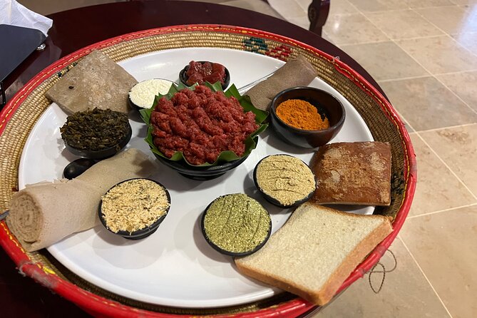 Go wheretheLocalsgo, Eatwhat thelocalseat!open Market&More Tours - Eating Ethiopian food at Yobez